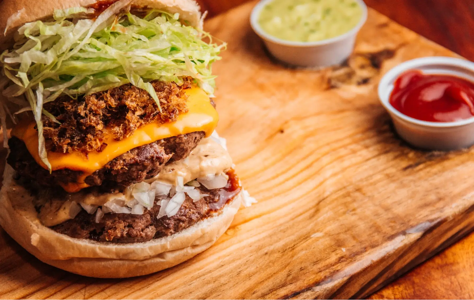 Burger and Sauces on Table